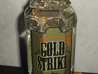 Flaska med Gold strike