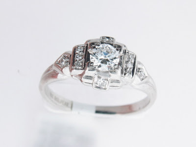 The unique shape of this ring is sure to get many compliments Cost 825