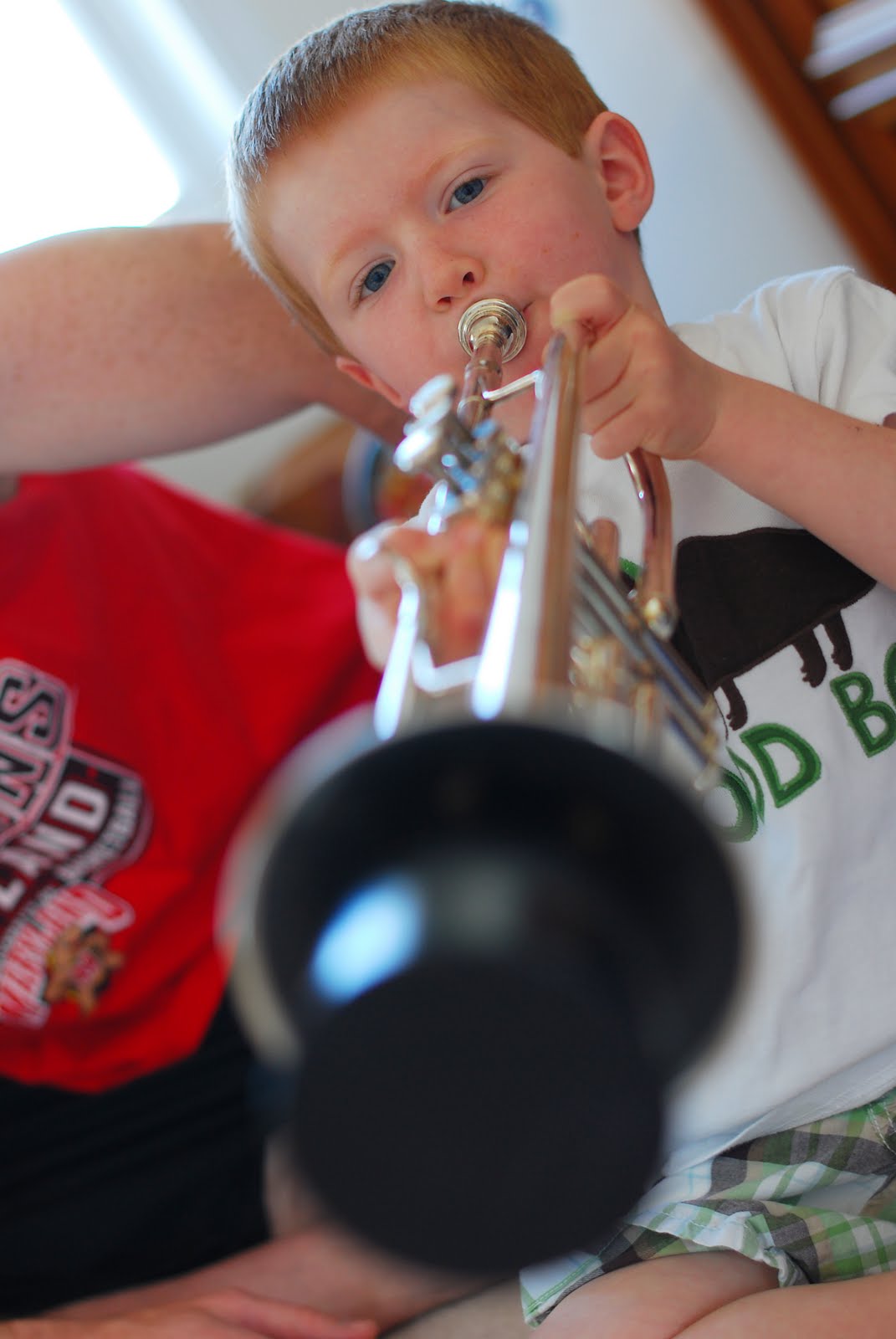 Semenick family Learning to play the trumpet