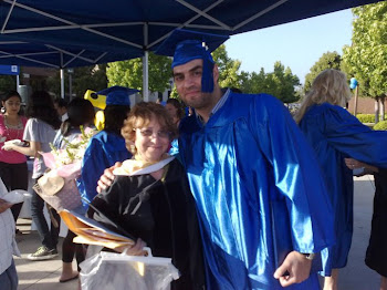 Picture of me with a former student, Tarek, at his graduation last spring