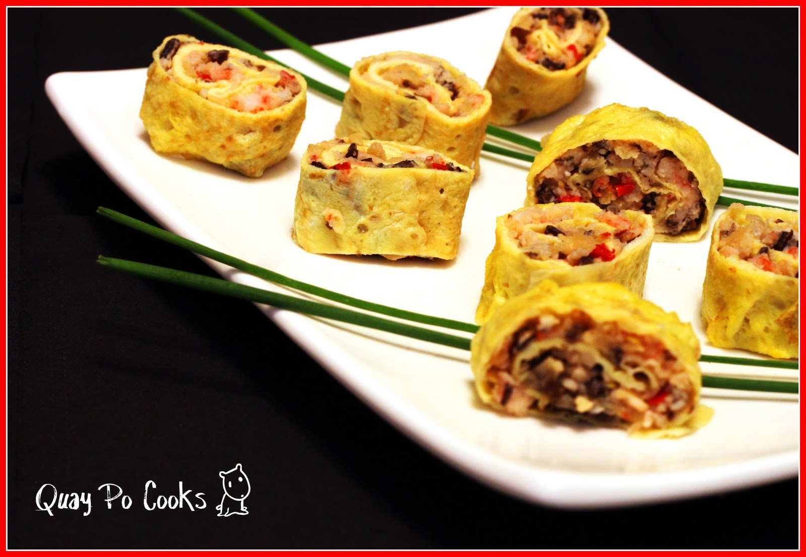 Quay Po Cooks Egg Roll with many symbols for Chinese New Year