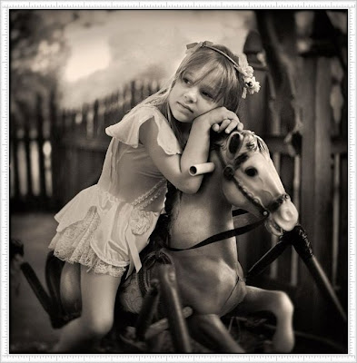 Simple And Cute Baby Girl With Her Horse
