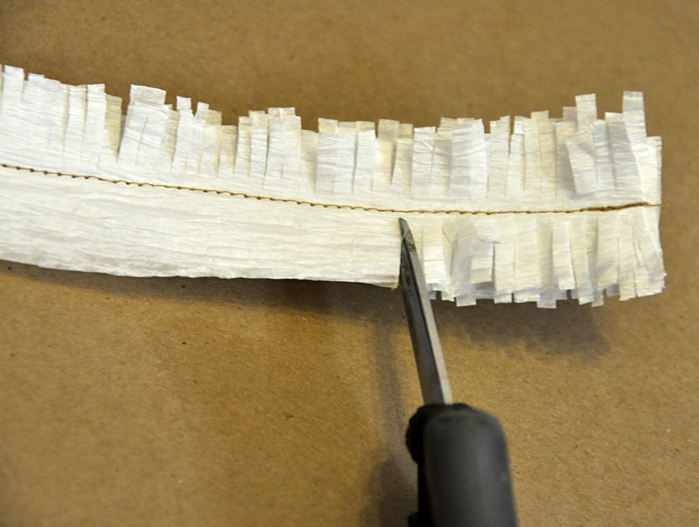 Tips and Techniques Fringe Trim on a Snowy Banner!