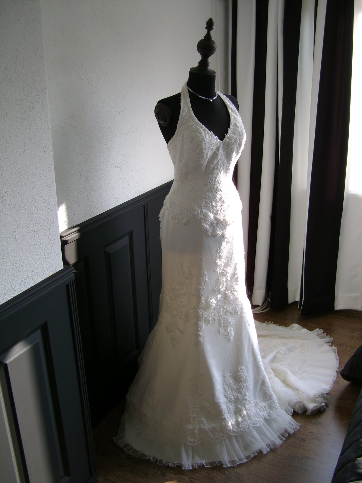 antique mannequins Jenny's wedding dress on a black mannequin