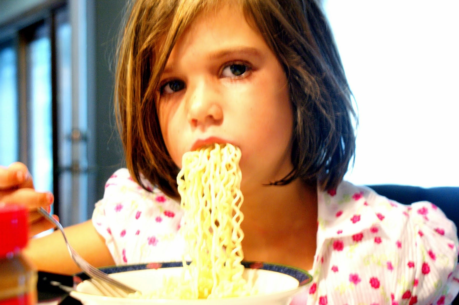 The Photographed Past The little girl loves her Ramen noodles