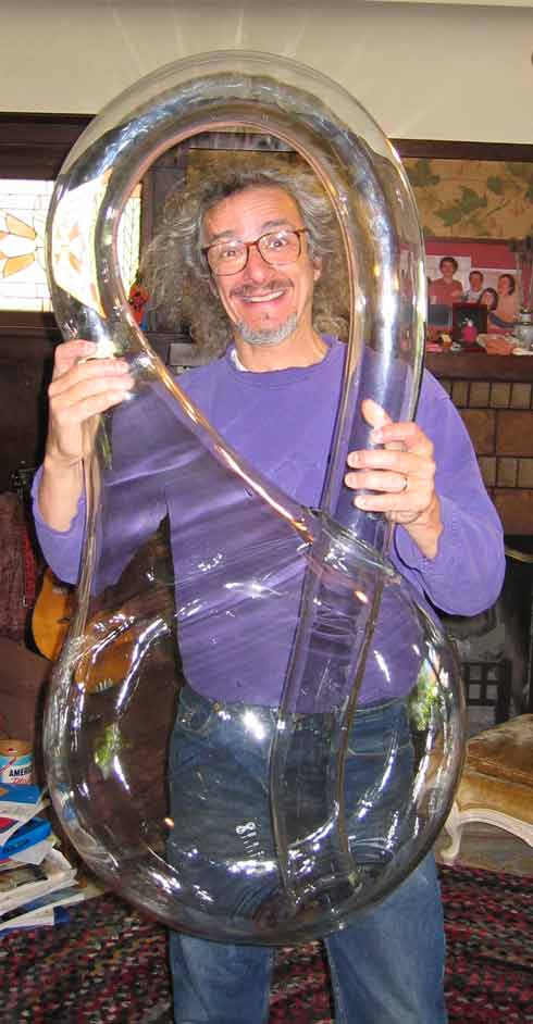 Giant Klein Bottle Held by Professor Clifford Stoll (click on picture for manufacturer's website)
