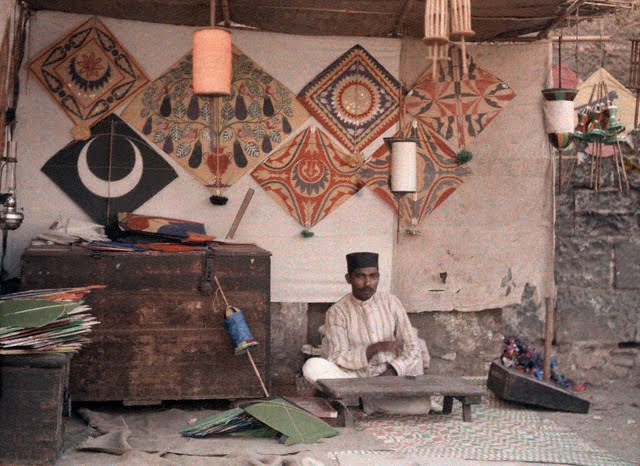 A kite merchant sits in his store in Bombay (Mumbai) - 1926