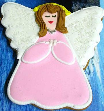 Frosted sugar cookie of a pink angel