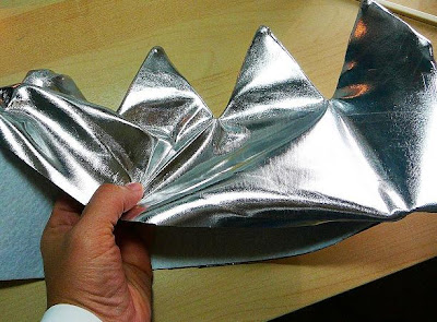 Metallic silver fabric sewn into a crown