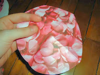 Folded rose-patterned scrapbook paper