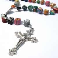 Clay rosary with silver cross