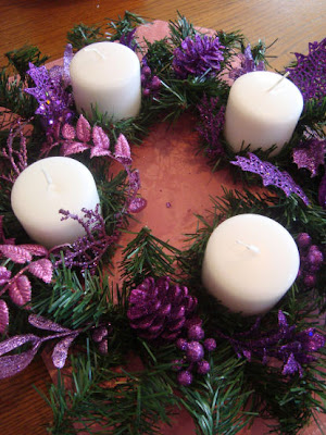 Pillar candles in a wreath