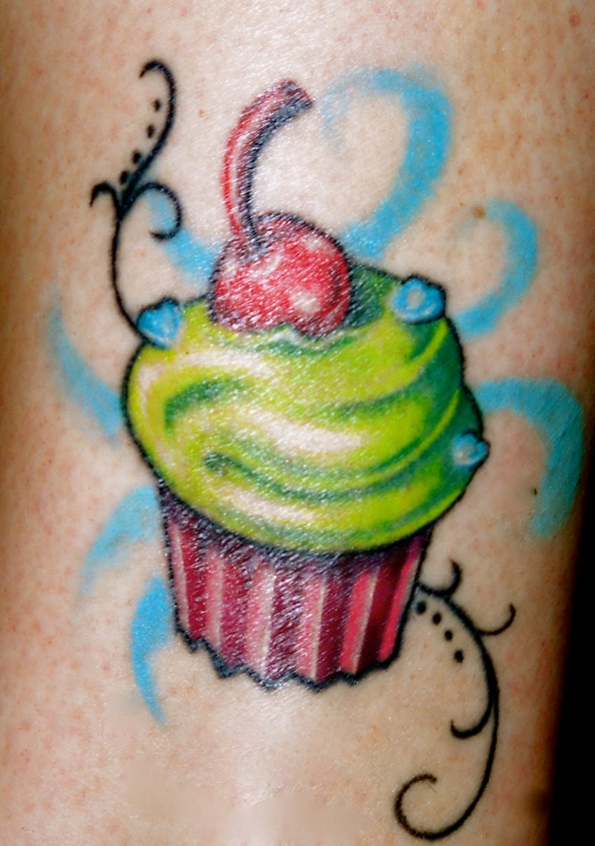 Cupcake tattoo with cherry on top