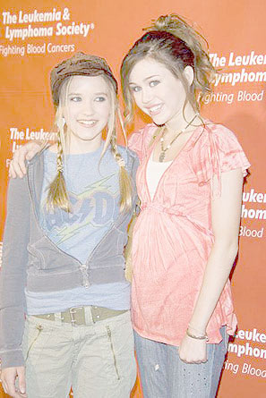 [miley-cyrus-2nd-annual-celebrity-rock'n-bowl.jpg]