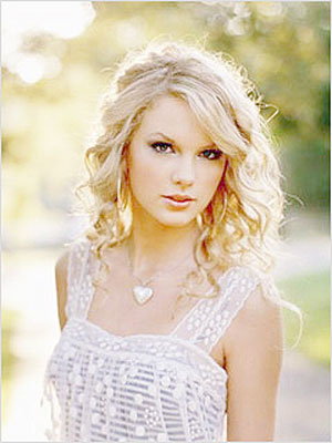 [taylor+swift+fearless+torrent.jpg]