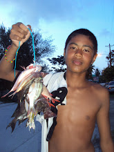 MeMong and the fish he caught spearfishing
