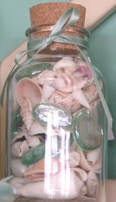 jar with seashells and ribbon