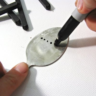 marking plant marker with spoon