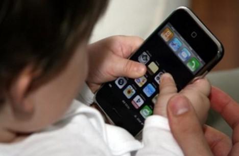 [baby-with-iphone-468x305.jpg]