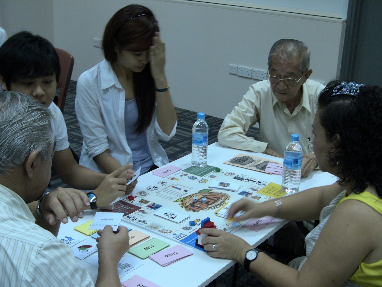 Singapore Action Group of Elders NET Financial Board Game
