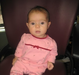 Sophia's first visit to my office and sitting in my chair!