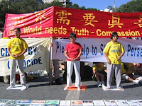 During the Republican National Convention in 2004, a group of Falun Gong followers meditate in Union Square and distribute literature to raise awareness of the group's persecution at the hands of the Chinese government. 