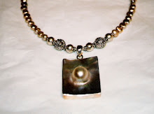 Mabe pearl in sterling pendant with freshwater pearls and Bali silver