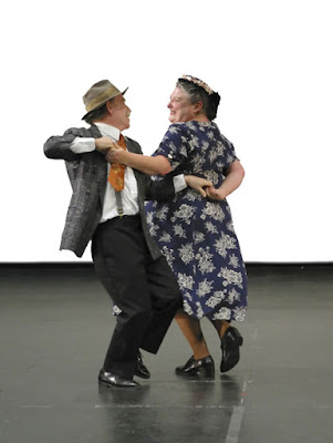 a very old couple dancing cutely