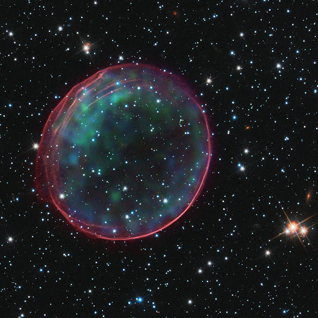 Hubble and Chandra picture celestial bubble SNR 0509 in the LMC