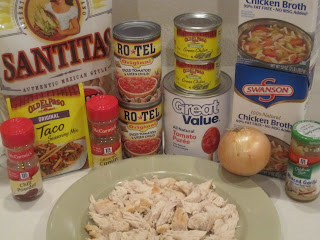 Chicken Tortilla Soup is a delicious, flavorful soup filled with chicken, tomato, cheese and diced green chilies. Life-in-the-Lofthouse.com