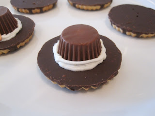 Pilgrim Hat Cookies are cute and delicious cookies in the shape of pilgrim hats that are made from fudge striped cookies, miniature peanut butter cups, vanilla frosting and orange food coloring. Life-in-the-Lofthouse.com