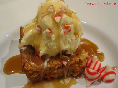 Candy Cane KISS Blondies are soft, buttery blondies filled with candy cane Kisses and topped with a maple butter sauce drizzle. Life-in-the-Lofthouse.com