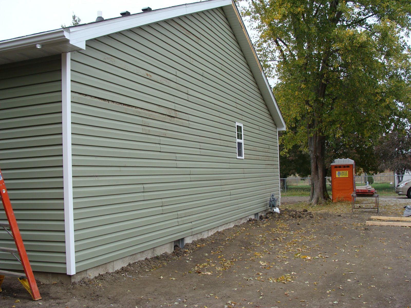 Team Bailey Finished sides of siding and the Guttering goes up!