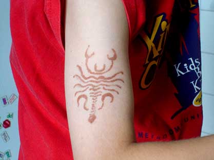 [arm-scorpion-tattoo.jpg]