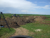 4 + 5 = 9: Water Line Leak In Our Back Yard