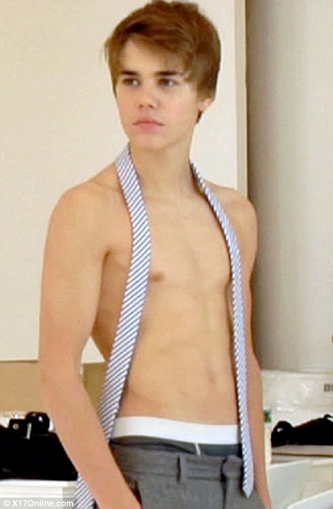 justin bieber and his girlfriend making. Topless: Teen sensation Justin