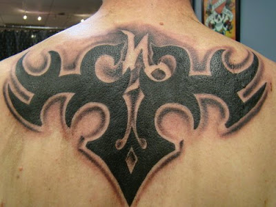 Tribal capricorn tattoos