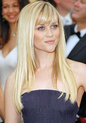 look great with this simple long hairstyle with an eye skimming fringe.