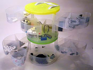 plastic multi-sectioned storage container with LEGO parts