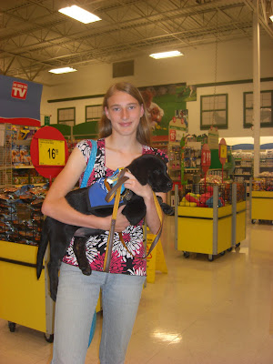 Picture of me holding Rudy in petsmart.  I'm wearing the same shirt that I wore when I picked up/dropped off Toby