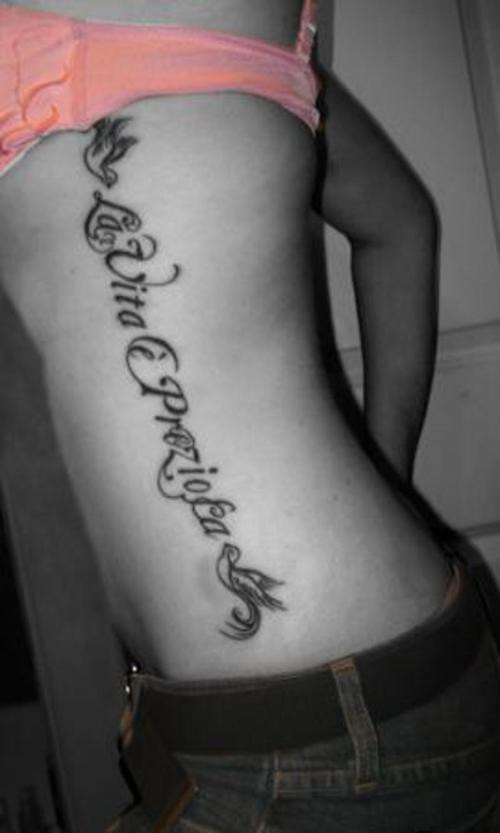 lettering tattoo on back. letter tattoo. fonts for