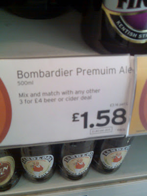 A supermarket price sign for Bombardier Premuim Ale