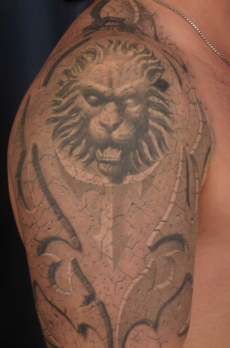Lion Face Tattoo 