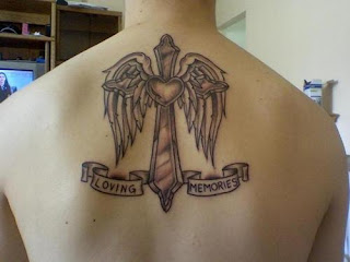 Cross Tattoo design with wings and heart