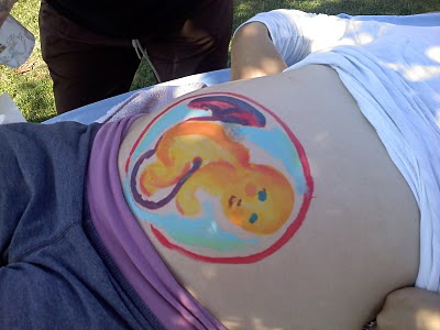 BellyraMa and Belly Painting Spinning Babies BellyraMA was glorious! 200 yoga mamas, pregnant and new, dads, doulas - and me! Painting bellies along the lake was bliss. The video is too small.