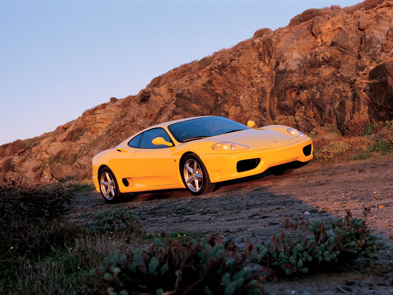 http://3.bp.blogspot.com/_uTGKd6u5pJ4/TRw2fV_-PQI/AAAAAAAAAQs/C6_qwCDLRjA/s1600/Yellow-Ferrari-360-Modena-Wallpaper.jpg