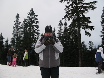 paula inspecting the snow