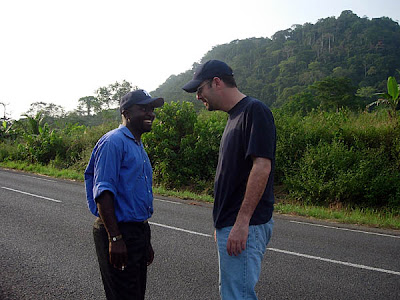 Mr. Boh and me goofing around along the highway from Yaounde to Kribi