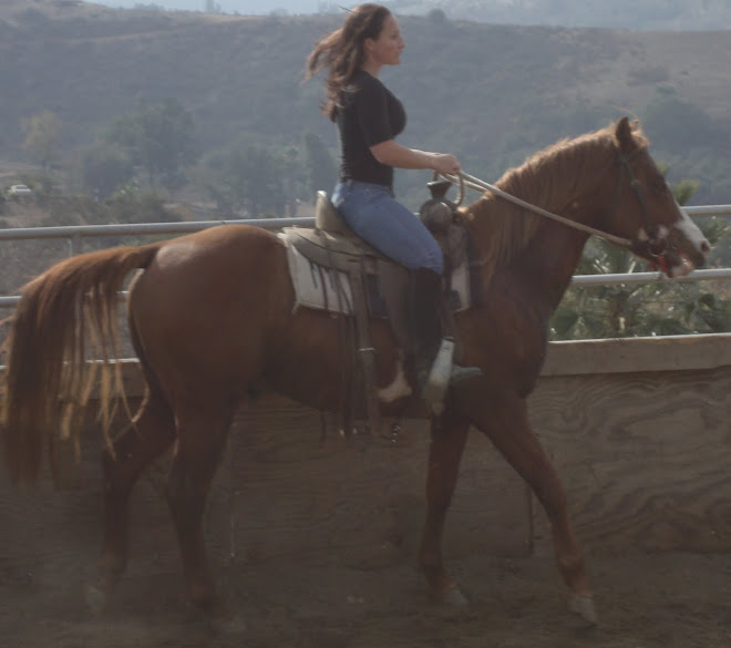 Brittany on Geronimo the paint stallion