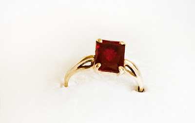 14 karat gold birthstone ring with square natural garnet